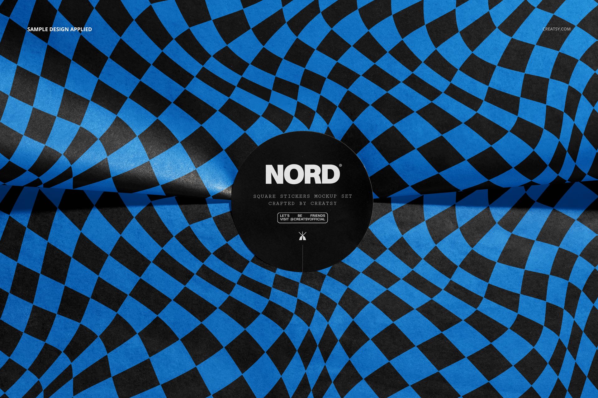 Round stickers with a bold blue and black wavy geometric pattern shown in a front view PSD mockup scene.