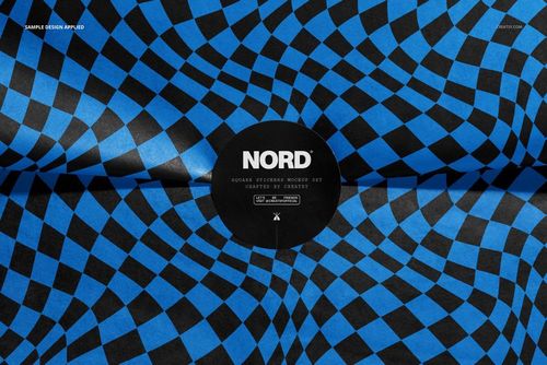 Round stickers with a bold blue and black wavy geometric pattern shown in a front view PSD mockup scene.