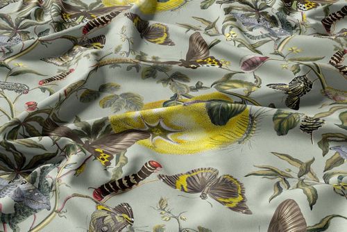 Polyester drapery curtain fabric mockup featuring a botanical and butterfly pattern in muted green and yellow tones.