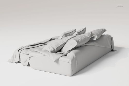 Luxury bedding set with multiple pillows and a draped blanket in light gray, shown from a side angle on a plain background.