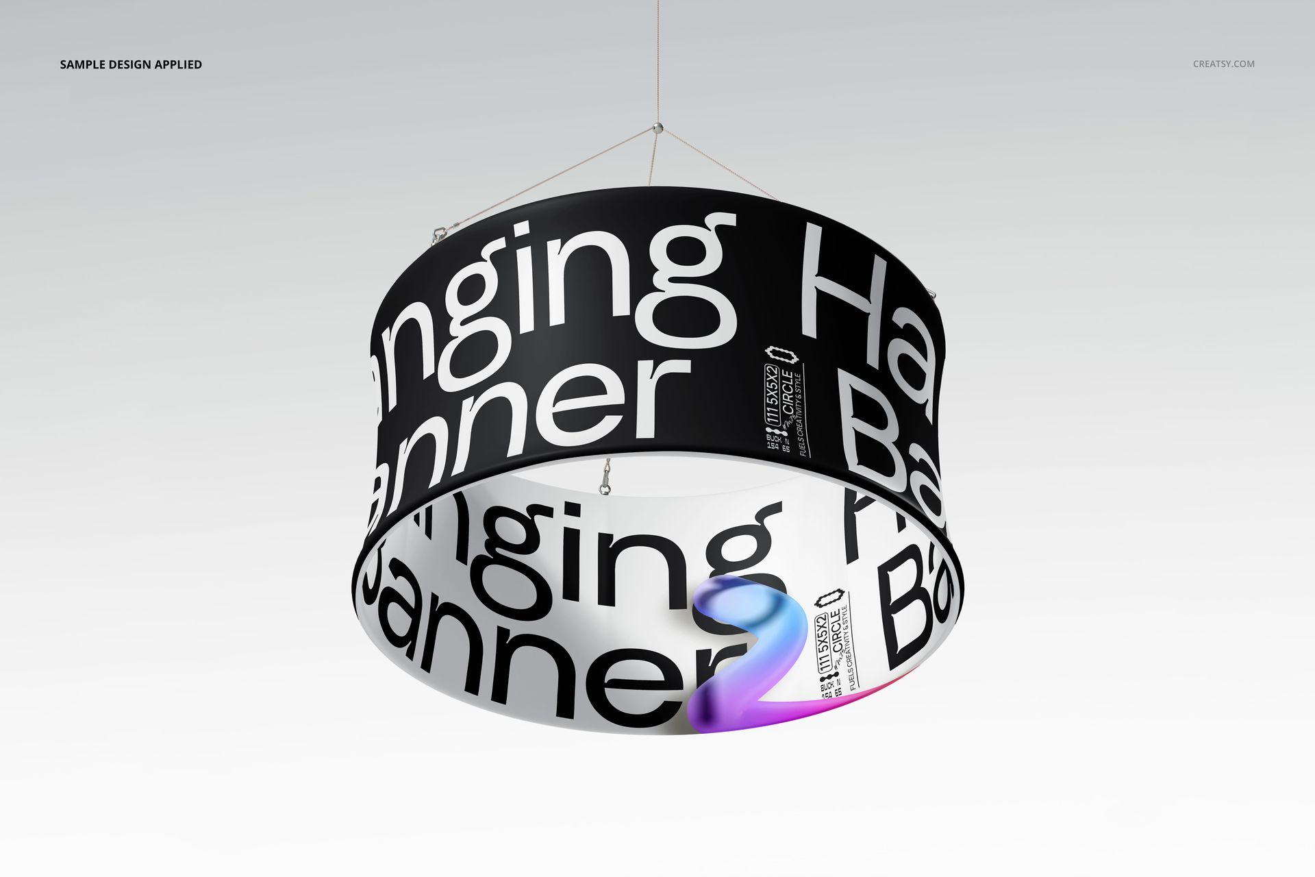 Large circular hanging display banner mockup with bold black and white text, suspended by wires in a minimalist indoor setting.
