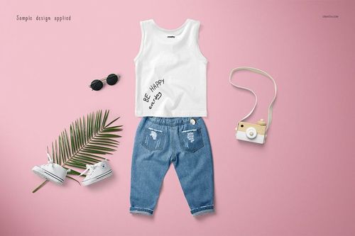 Front view of a baby tank top mockup set with blue jeans, white shoes, sunglasses, and a toy camera on a pink surface.