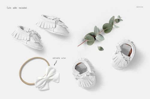 White baby harem pants mockup set displayed on a light background with eucalyptus leaves and accessories.