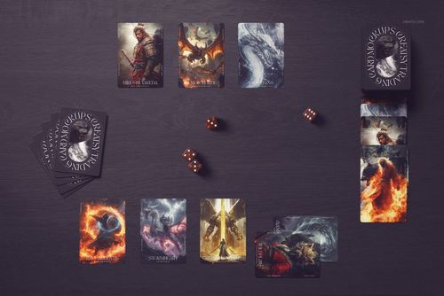 Trading cards with fantasy artwork are arranged on a dark tabletop, accompanied by several brown dice.