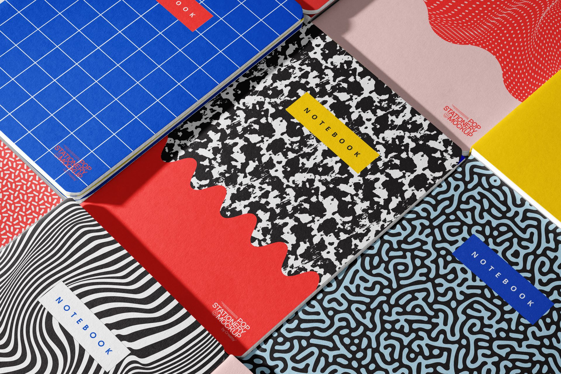 Group of Notebooks Mockup - Angled View