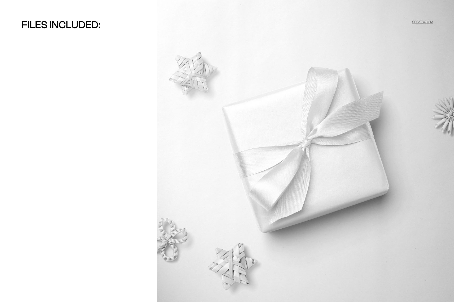 Square gift box with a white satin ribbon bow placed on white Christmas wrapping paper, top view mockup scene.
