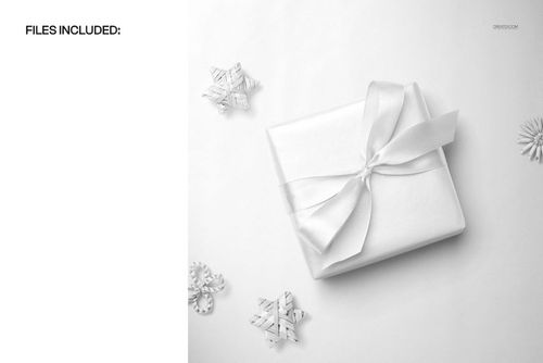 Square gift box with a white satin ribbon bow placed on white Christmas wrapping paper, top view mockup scene.