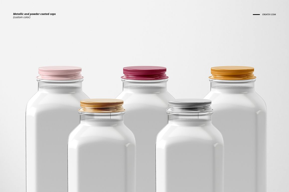 PSD mockup featuring five glass bottles with various colored lids, displayed from the front on a light backdrop.