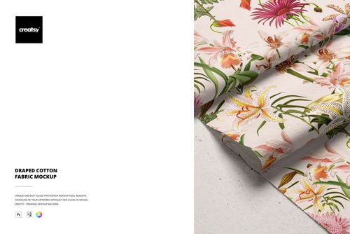 Cotton fabric mockup featuring vibrant flowers and green leaves, displayed folded on a neutral background.