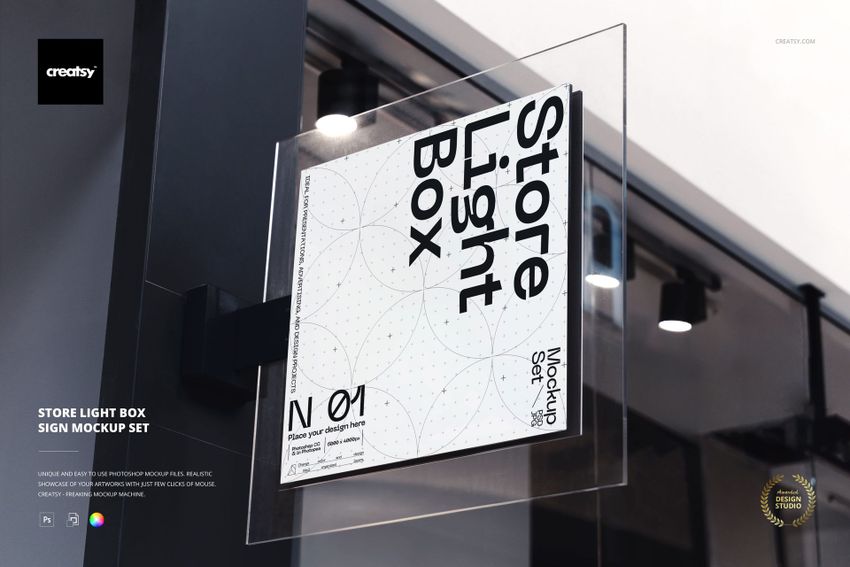 Square light box sign mockup mounted on a dark wall indoors, featuring a clean white background and bold text.