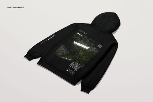 Black adult hoodie mockup displayed from the back at an angle, featuring a large graphic print and visible hood.