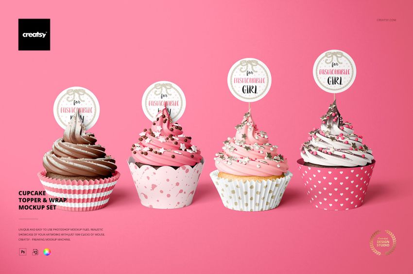 Cupcake PSD mockup featuring four cupcakes with patterned wrappers and toppers, displayed against a pink surface.