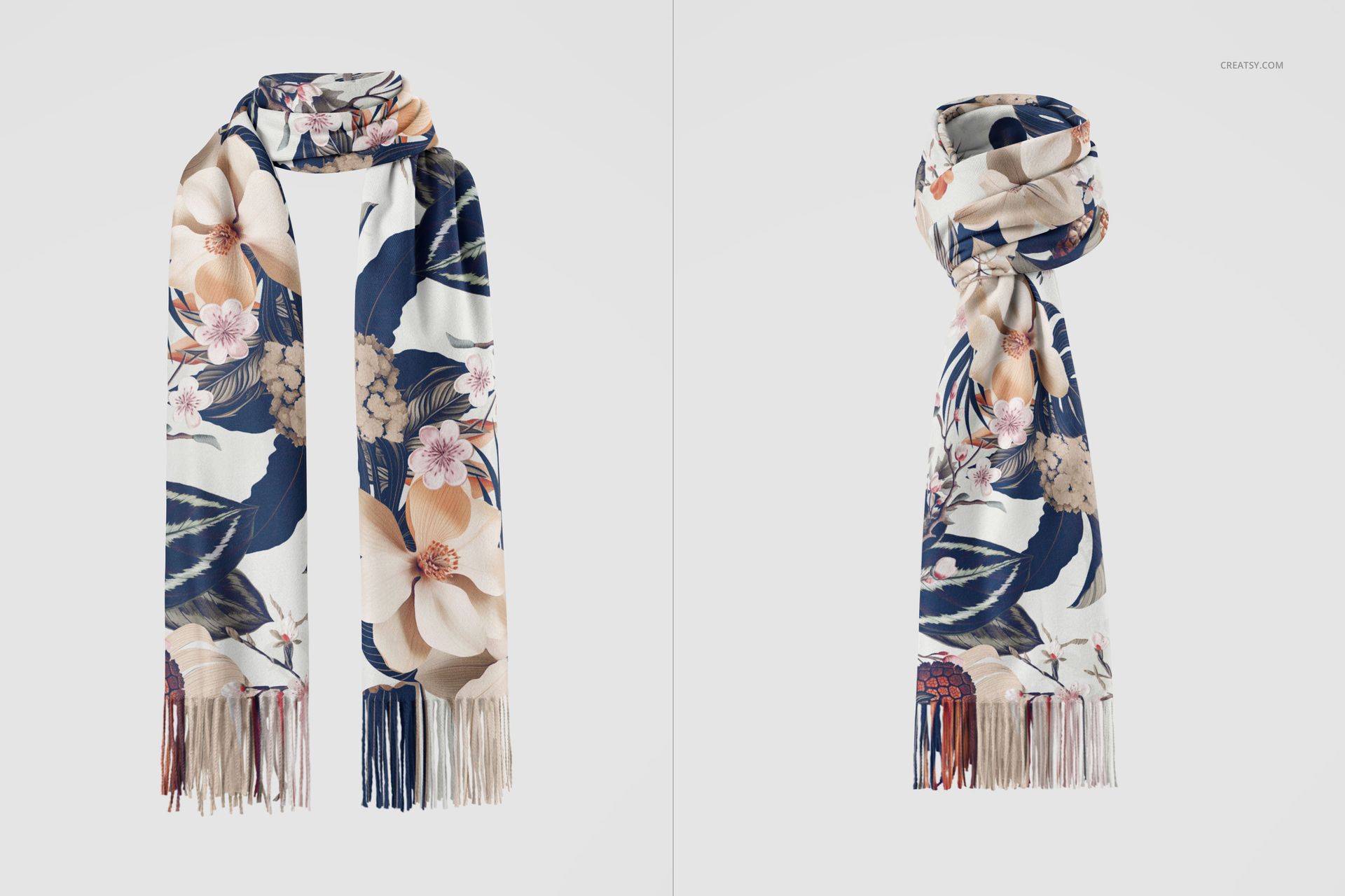 Cashmere scarf with a floral pattern in navy, beige, and pink tones, shown from the front and side on a white background.