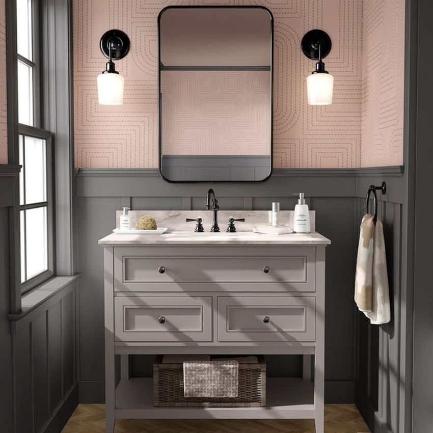 Bathroom mockup featuring a light gray vanity with marble countertop, geometric wallpaper, and two wall sconces above a mirror.
