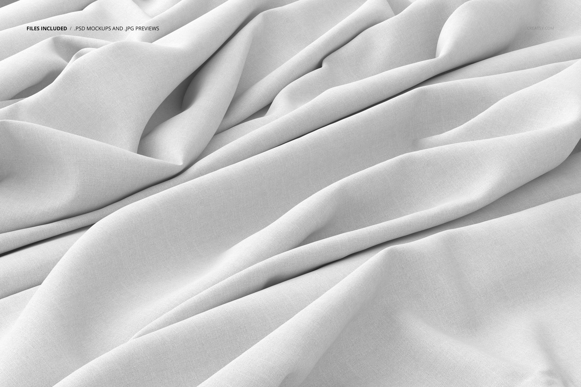 Close-up of light-colored fabric with visible creases and soft shadows, presented in a PSD mockup format.