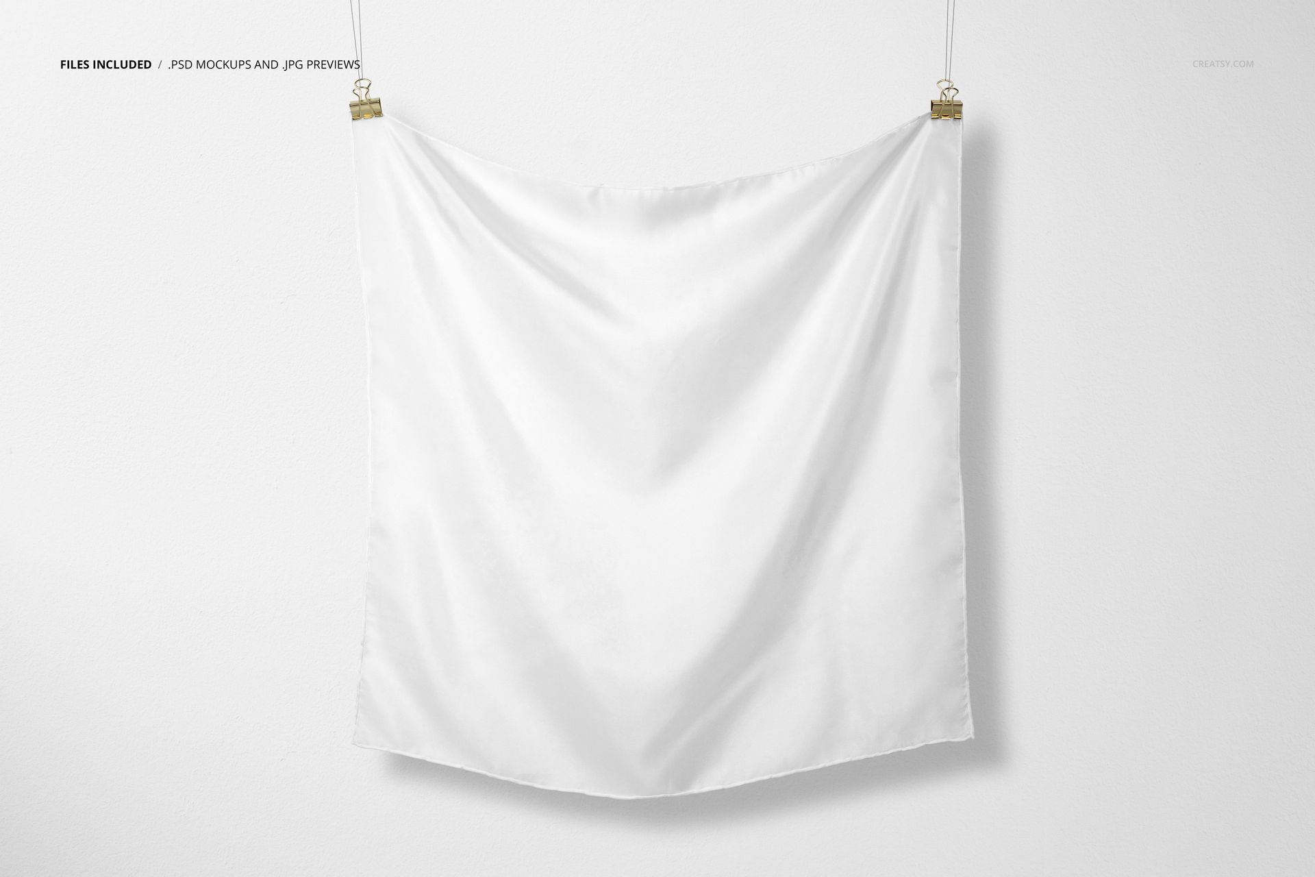 Square silk scarf mockup hanging against a white wall, shown from the front with slight fabric folds visible.
