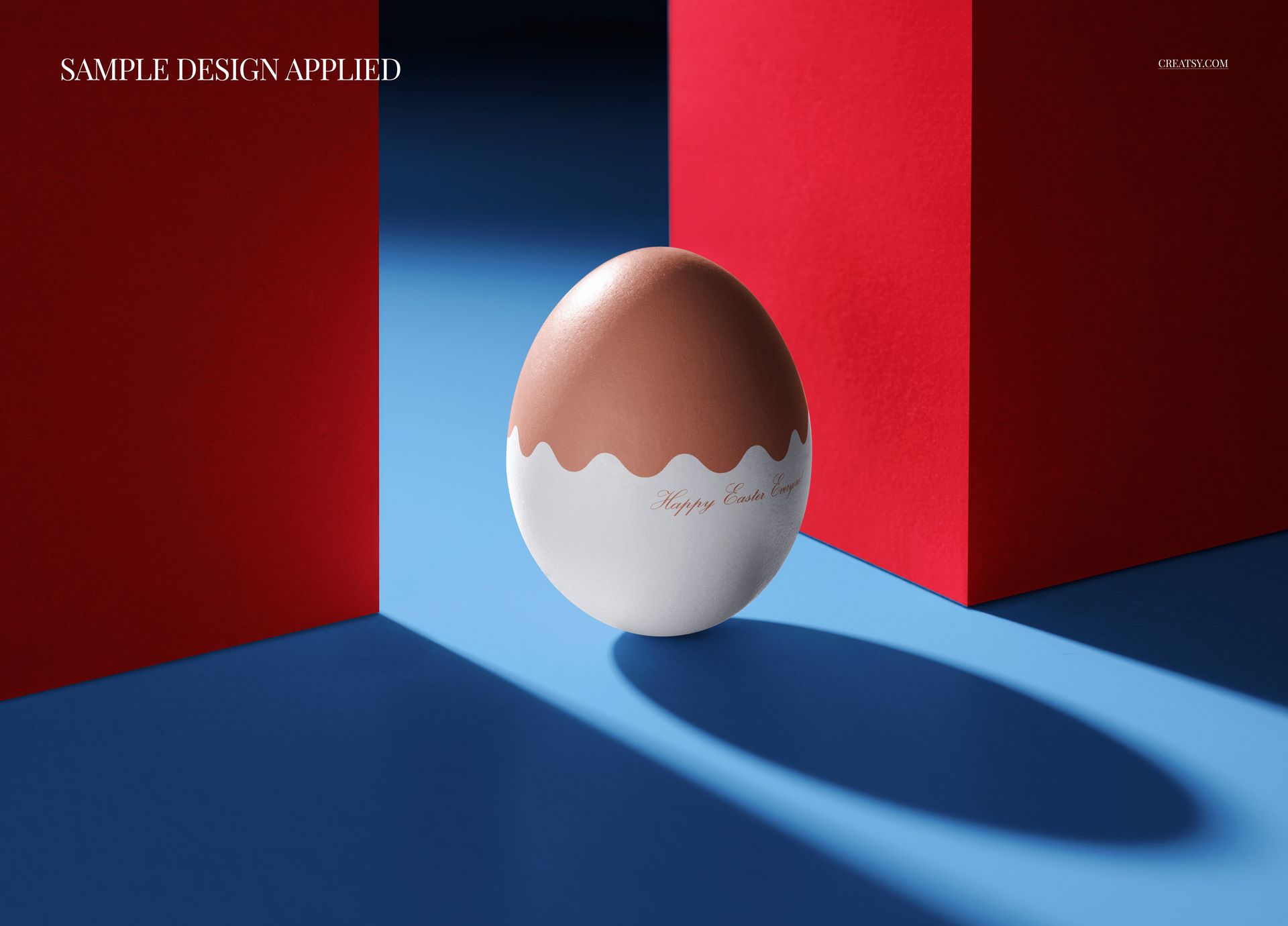 PSD mockup featuring a round Easter egg with brown and white design, set in a studio with red geometric shapes.