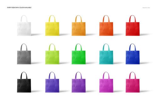 PSD mockup featuring fifteen non-woven tote bags in assorted colors, organized in a grid layout against a white surface.