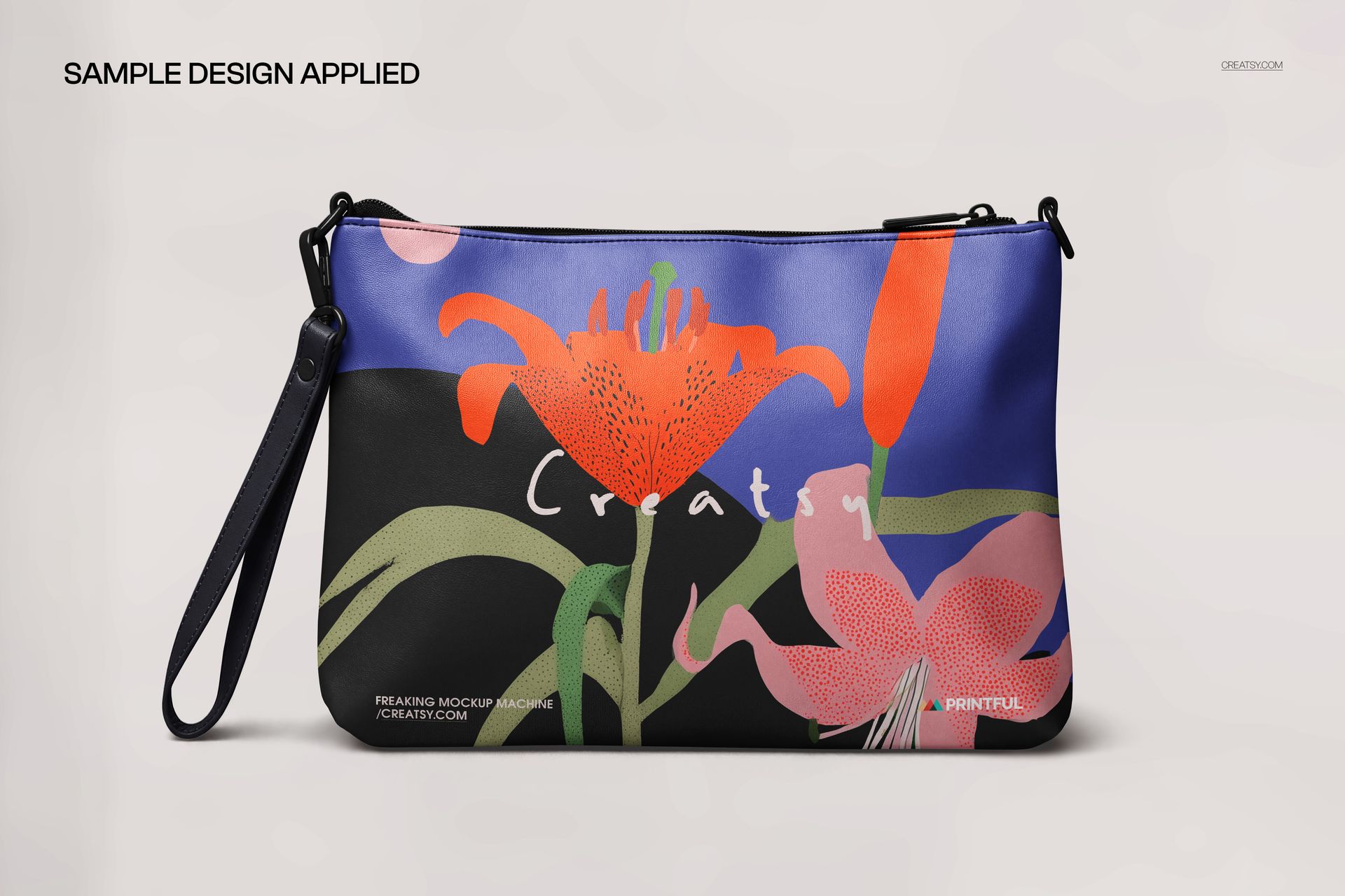 PSD mockup of a crossbody handbag featuring bold flower designs in orange and pink, shown from the front perspective.