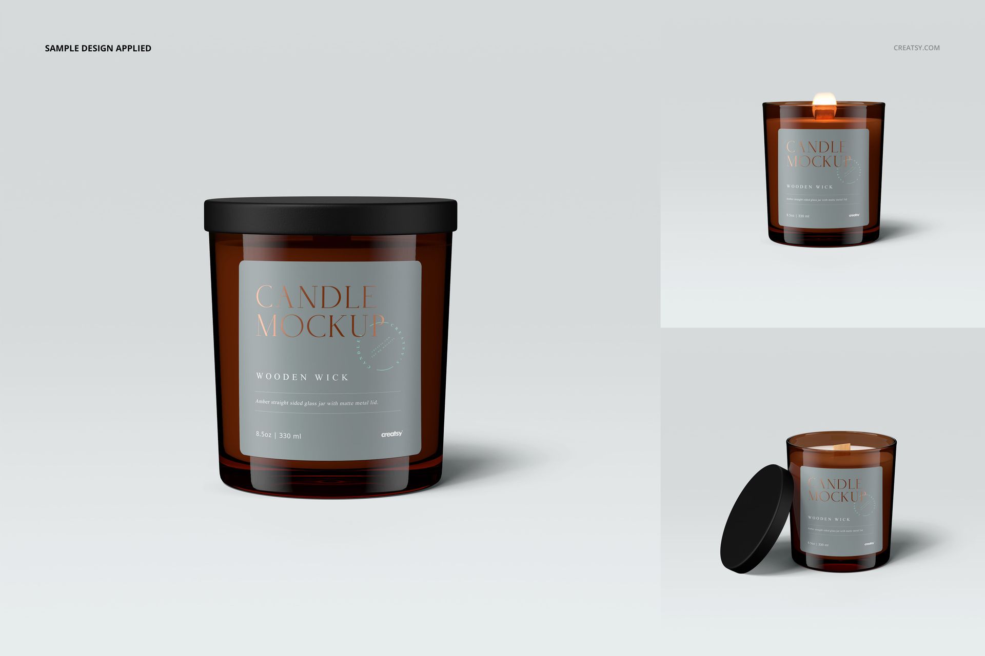 Amber glass jar candle with matte black lid and wooden wick, shown in a front view mockup set on a light background.