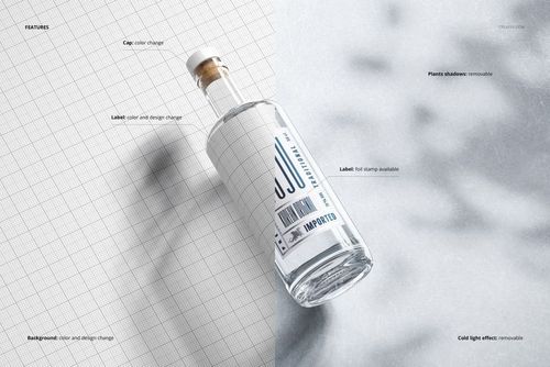 Classic corked glass bottle mockup shown at an angle on a split background, featuring a customizable label and cork.