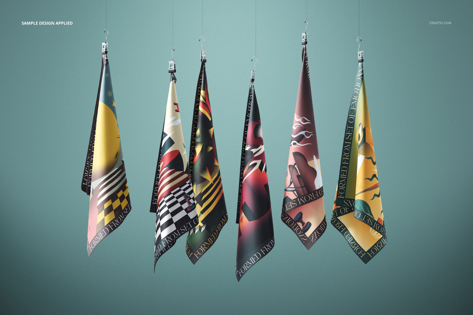 PSD mockup featuring five fashion accessory silks suspended from hooks, each with unique graphic designs.