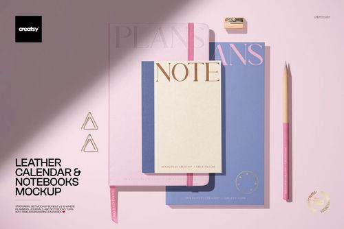 Stationery PSD mockup featuring a leather calendar, large and small notebooks, pencil, clips, and sharpener arranged neatly.