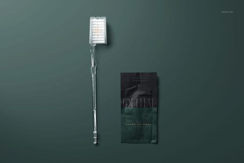 Hotel dental kit mockup featuring a transparent toothbrush and a compact toothpaste sachet, arranged side by side.