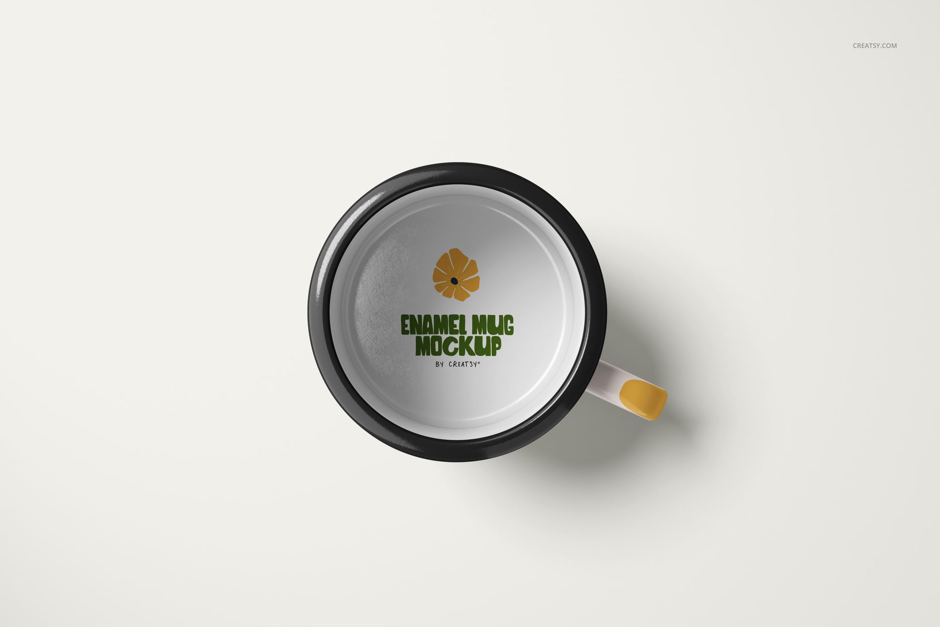Enamel mug mockup shown from above, featuring a black rim and yellow detail on the handle against a white background.