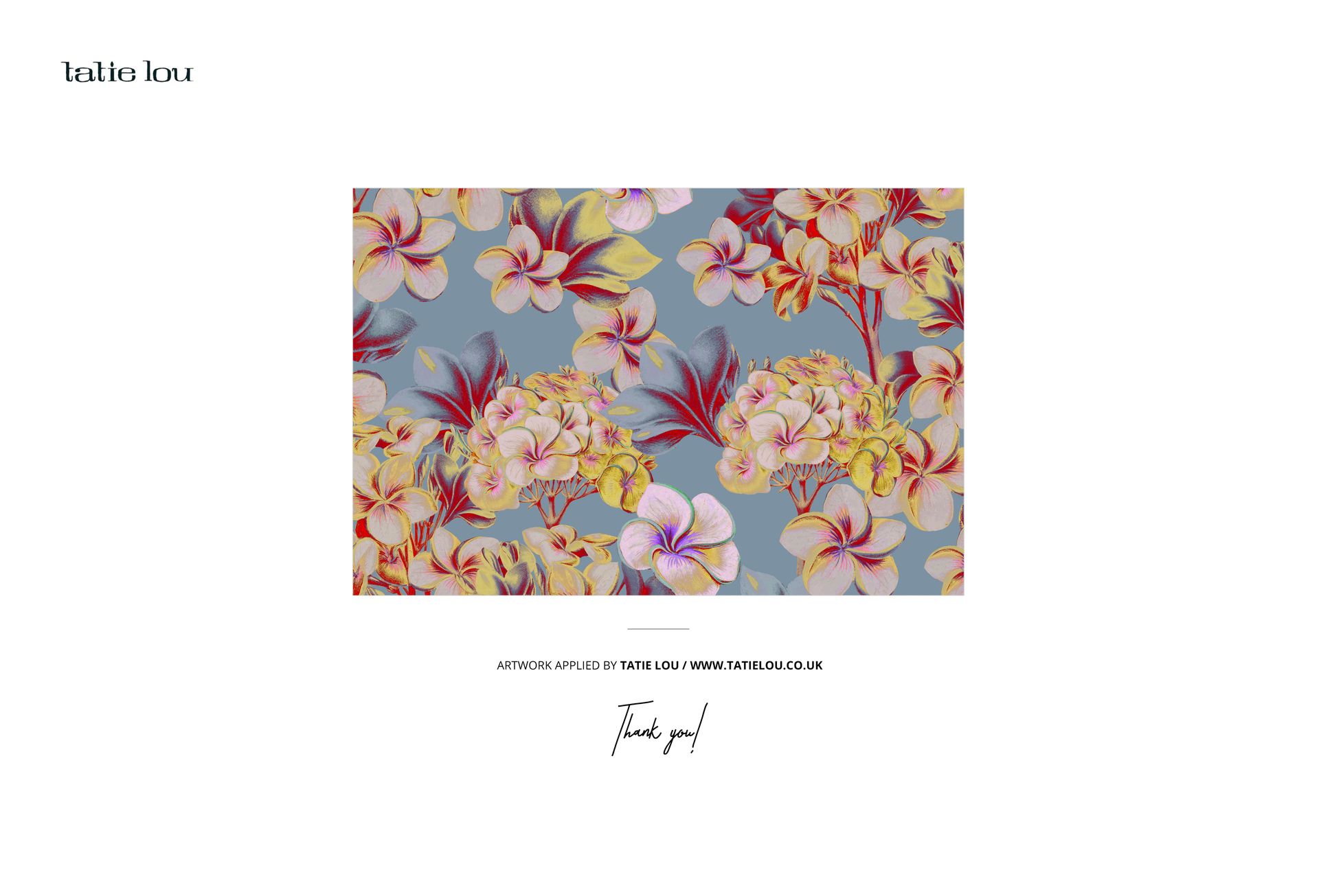 Floral pattern with yellow and pink flowers and green leaves on a blue background, shown in a mockup scene.