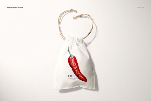 White linen pouch mockup featuring a red chili pepper design, shown from above with twisted rope drawstrings.