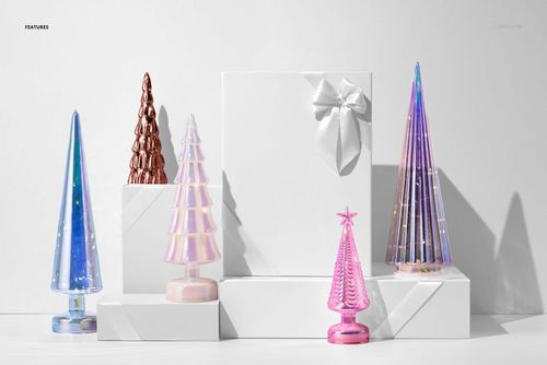 PSD mockup featuring glass Christmas tree lamps in pink, blue, and copper tones with white gift boxes and steps.