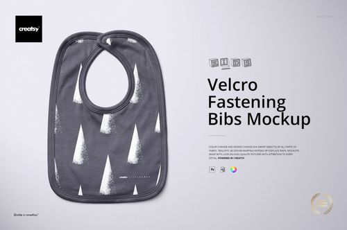 PSD mockup showing a single Velcro bib in dark gray with white tree-like shapes, presented from a top perspective.