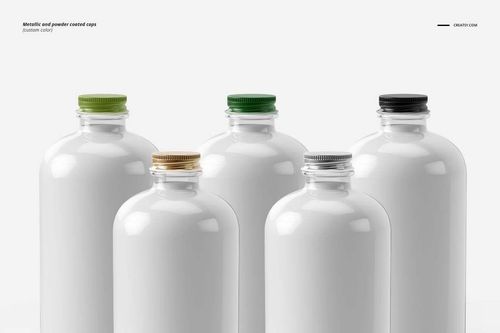 PSD mockup showing five glass bottles with glossy white surfaces and different colored caps on a plain background.