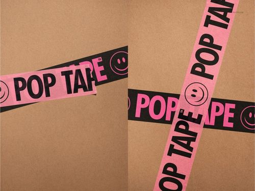 Paper packaging tape mockup featuring pink tape with black lettering and smiley icons, arranged on a kraft background.