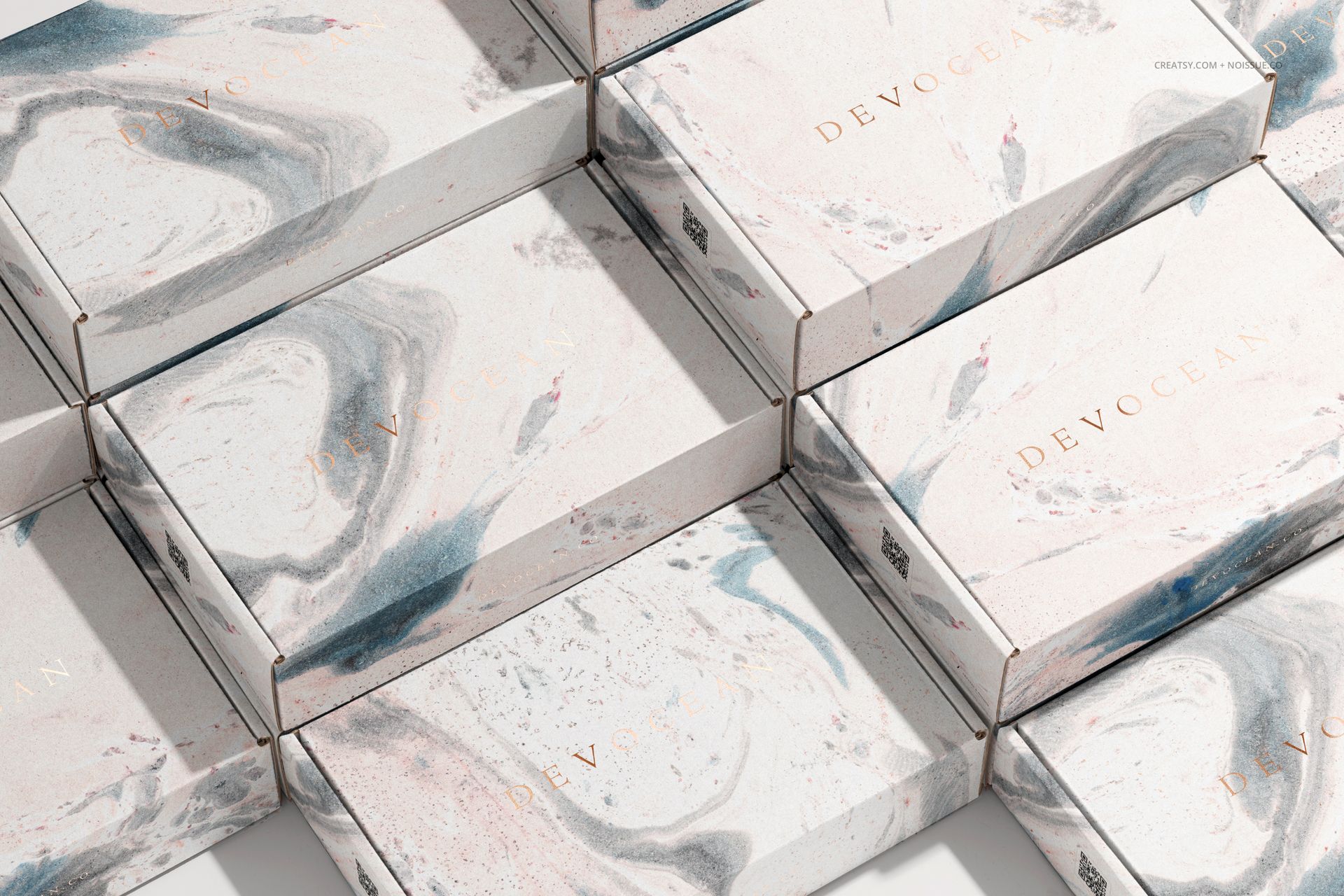 PSD mockup of mailing boxes with swirling pastel patterns, displayed in a neat, overlapping arrangement from above.