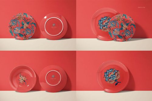 PSD mockup of ceramic plates with decorative flowers and solid colors, shown from above on a two-tone background.