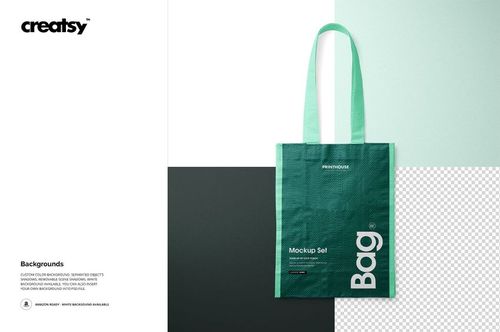Front view of a woven tote bag mockup with green fabric, long handles, and a minimalist design on a split color background.
