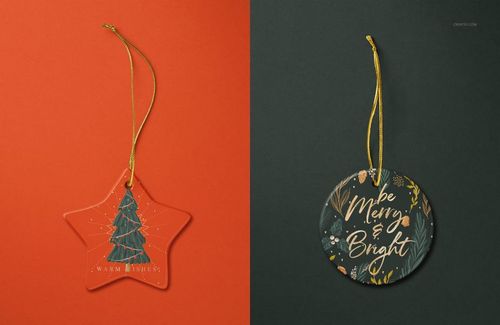 Christmas ornaments mockup showing a star-shaped piece on red and a round ornament on green, each with holiday-themed prints.