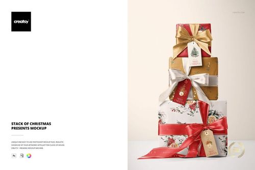 Stacked Christmas gift boxes in various sizes, decorated with elegant wrapping paper and shiny ribbons, PSD mockup scene.