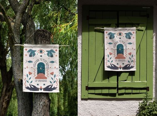26x36 woven tapestry mockup featuring a colorful pattern, displayed on a tree and rustic green window shutters.
