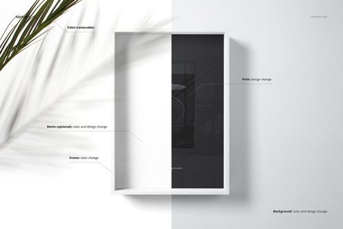 Wooden picture frame mockup shown from a top view, with half the frame in shadow and half in light on a white surface.