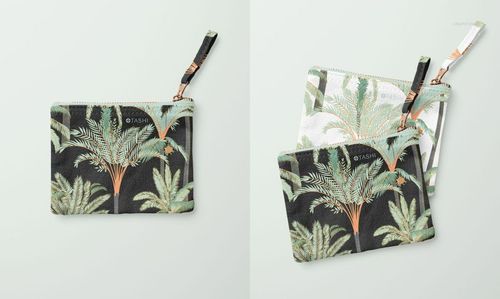 Flat canvas pouch with fabric zipper pull featuring tropical palm tree pattern, shown from top view on light background.
