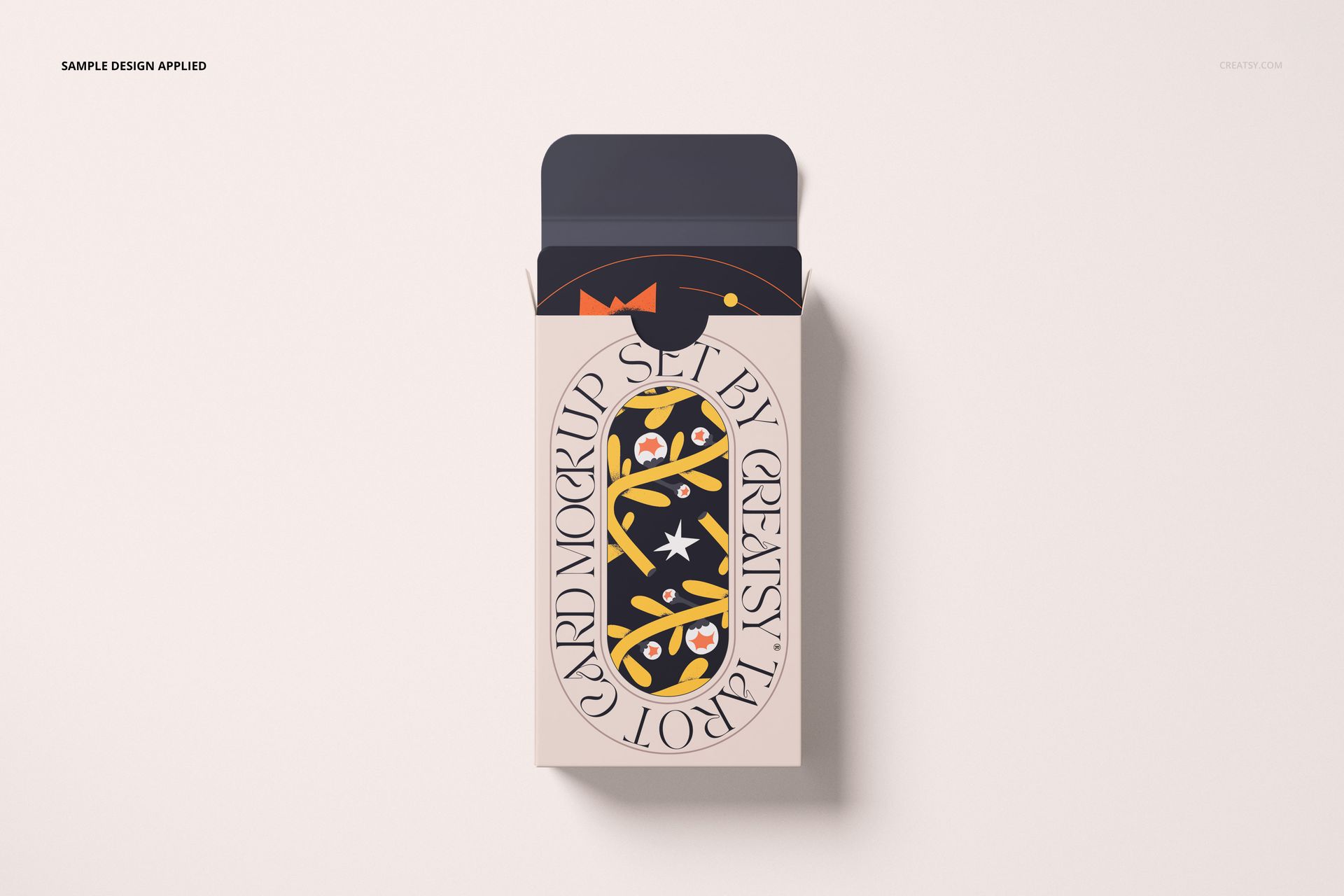 Top view of tarot cards mockup set with a partially opened box showing illustrated card designs in dark colors.