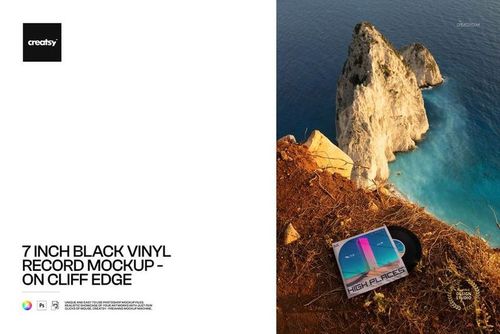 PSD mockup showing a vinyl record and album sleeve on a sunlit cliff with dramatic sea cliffs and clear blue water below.