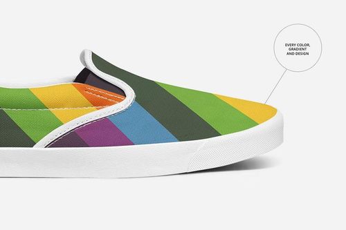 Side view of a slip-on shoe mockup showing multicolored diagonal stripes and a clean white sole on a light background.