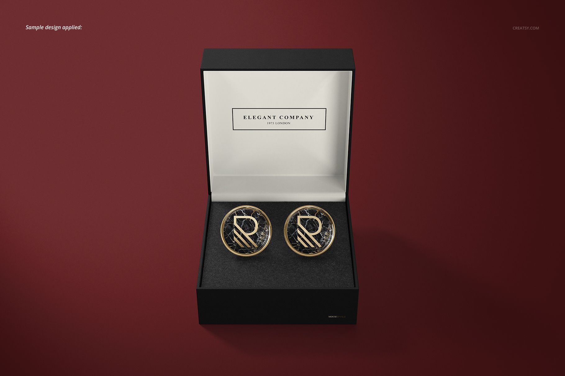 Cufflinks mockup set featuring two circular cufflinks in a black presentation box, viewed from above.