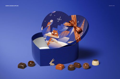 Open heart-shaped box mockup with patterned lid and ribbon, surrounded by various chocolates on a blue background.