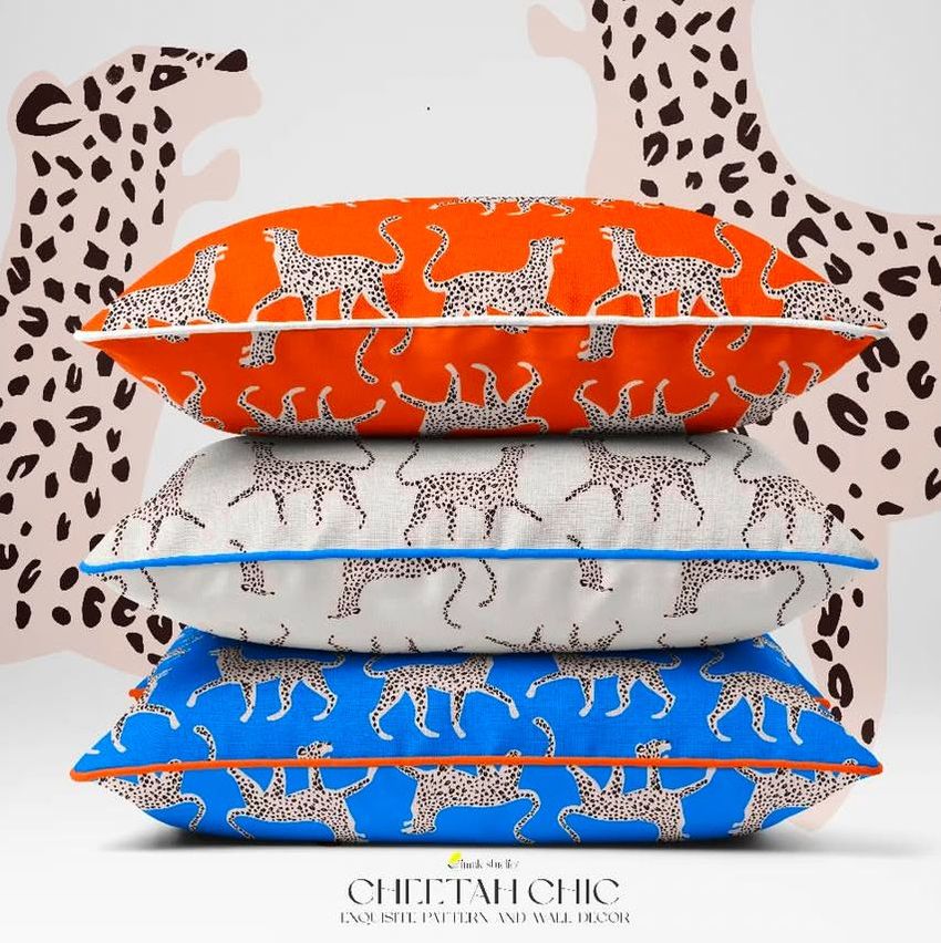 Reversible piped cushions mockup featuring three stacked pillows with cheetah patterns in orange, white, and blue colors.