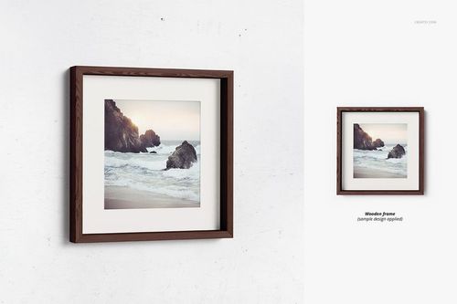 Wooden deep frame mockup featuring a beach scene print, presented in a well-lit room with a textured white wall.